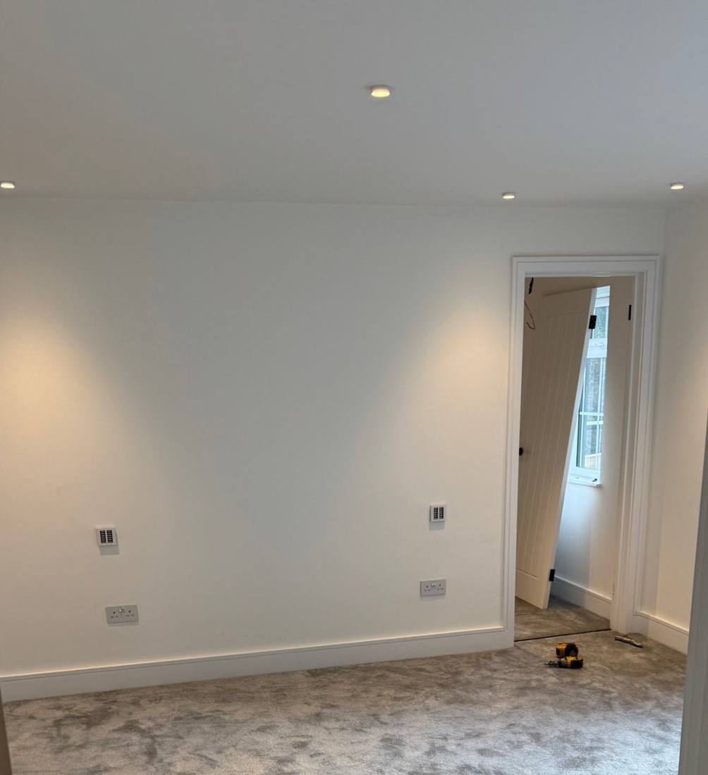 Finished room: downlights and lighting control keypads